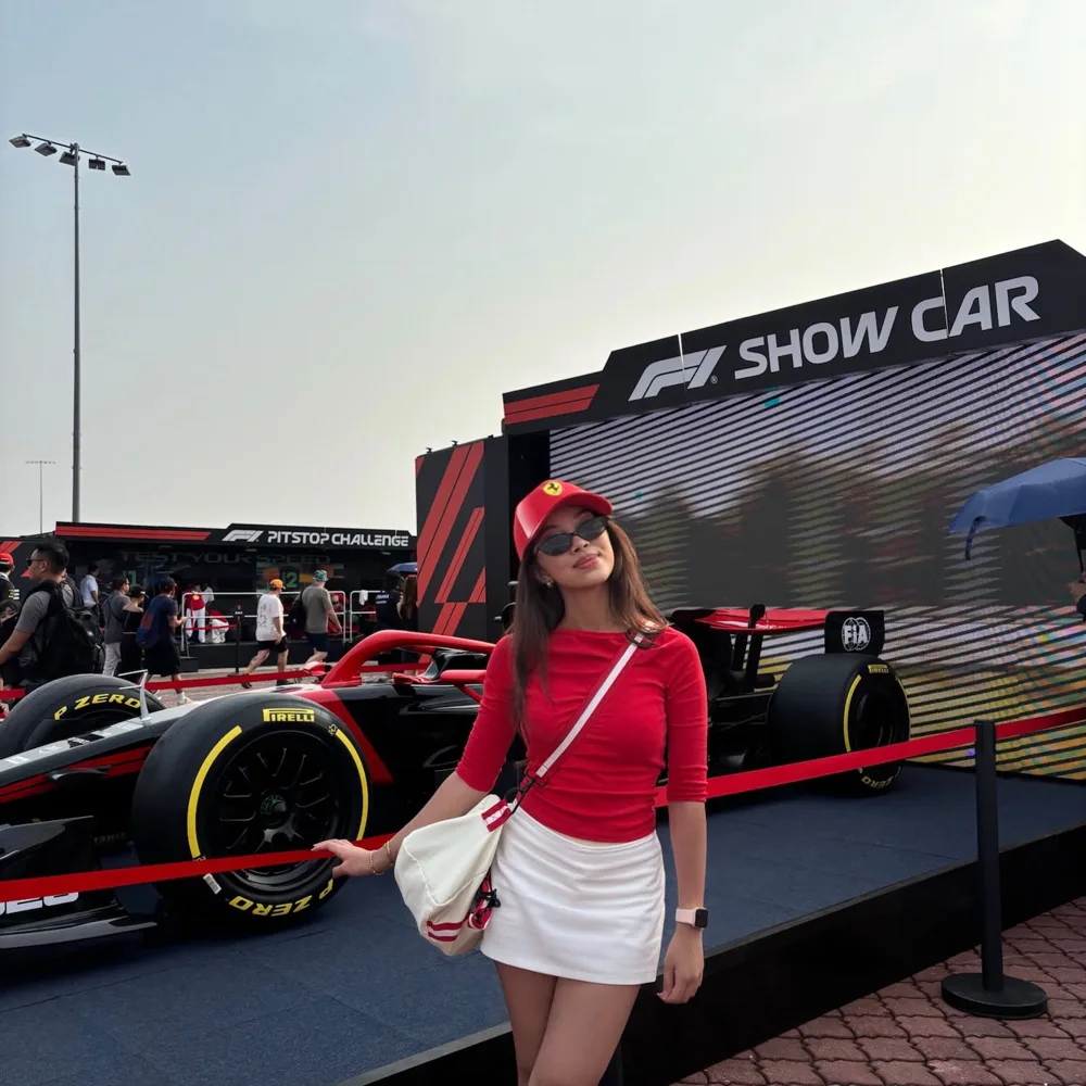Wearing Neloire at the F1 show car